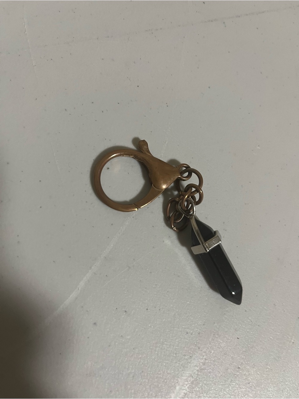 Gold-Tone Keyring with Black Crystal Pendant